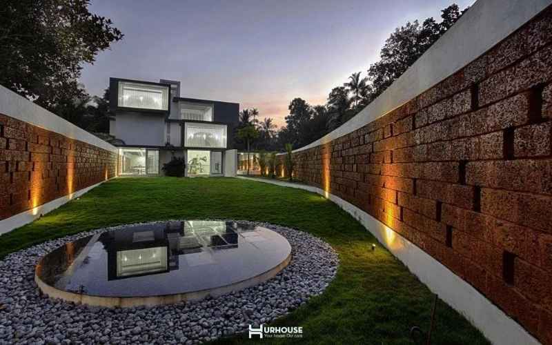 đá ong là vật liệu địa phương trong kiến trúc nhà vườn 